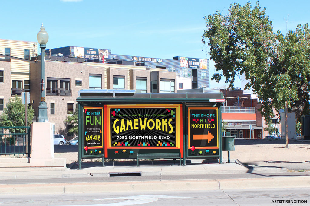Bus Stop Curbside Castle Showcasing an Advertisement for Gameworks that is Pointing towards their Shop at Northfield